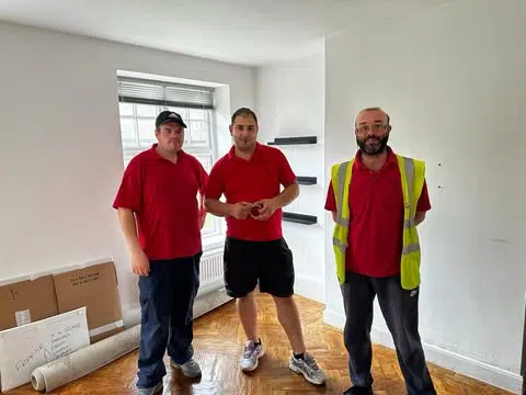 Ants Removals Finchley team standing in a client’s home